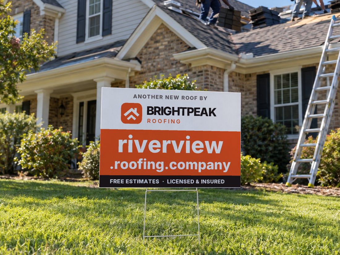riverview.roofing.company on a yard sign in front of a house getting a new roof